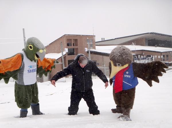 Coronet Peak mascots Shred (L) and Spike (R ) celebrate new snow with ski area manager Ross Copland.